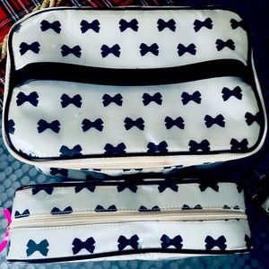 Kate Spade laminated cosmetic case and makeup bag fit together and both zip!